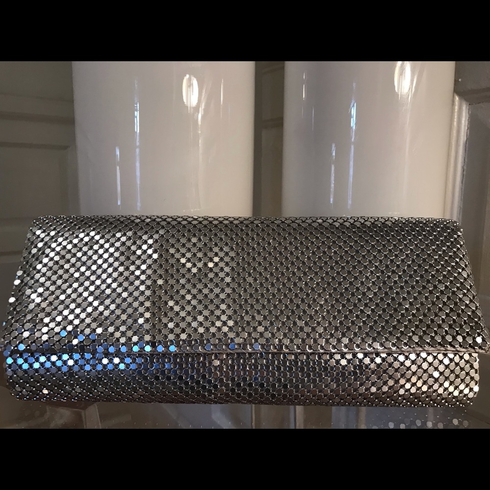Silver metal clutch